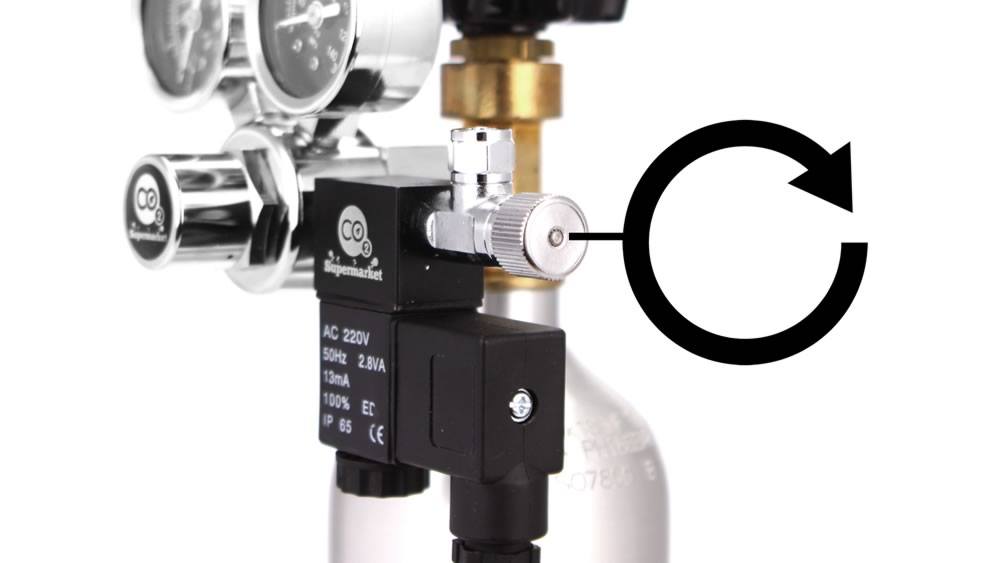 Close CO2 needle valve